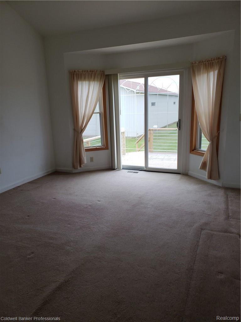 11336 Lambs Road Memphis, MI 48041 - Photo 35 of 49 Master Bedroom with Door wall to the Deck