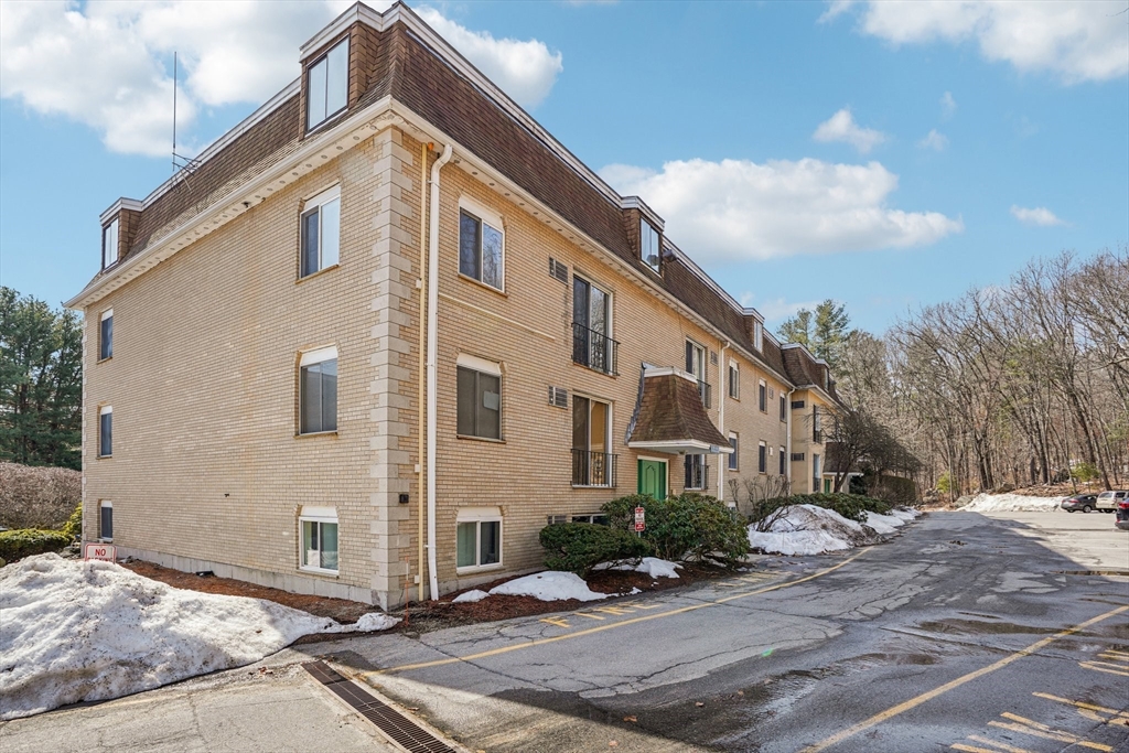 208 Swanson Road, Unit 526 Boxborough, MA 01719 - Photo 17 of 18 a front view of a house with a yard