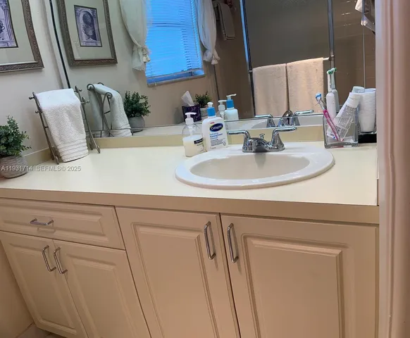a bathroom with a sink and a toilet