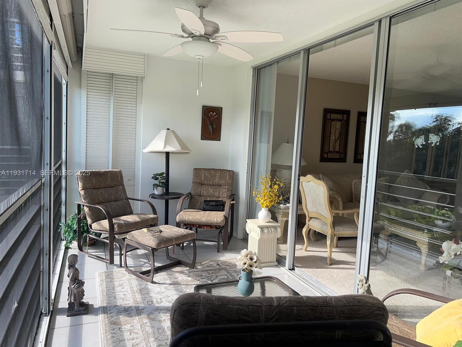 821 Cypress Boulevard, Unit 312 Pompano Beach, FL 33069 - Photo 49 of 52 a living room with furniture