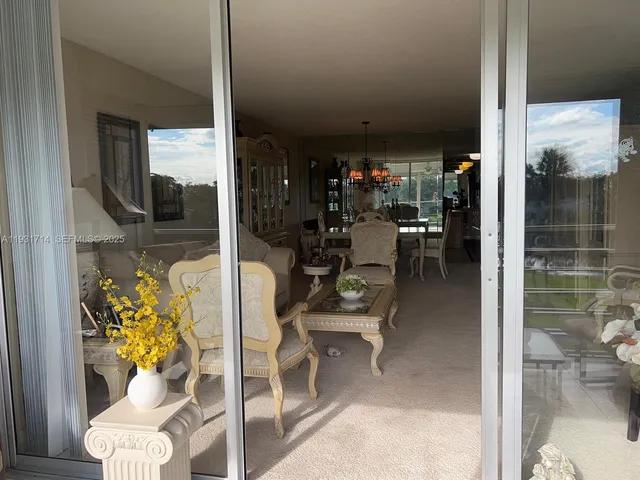 a view of a golf course with a lake