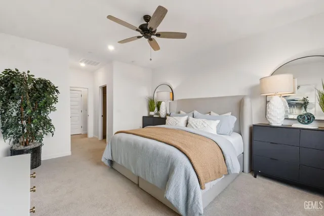 a bathroom with a double vanity sink mirror and