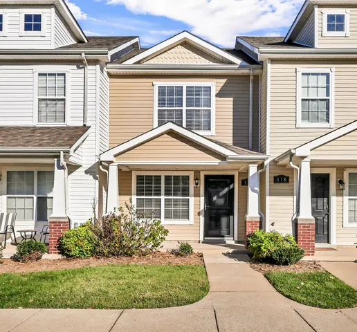 front view of a house and a yard