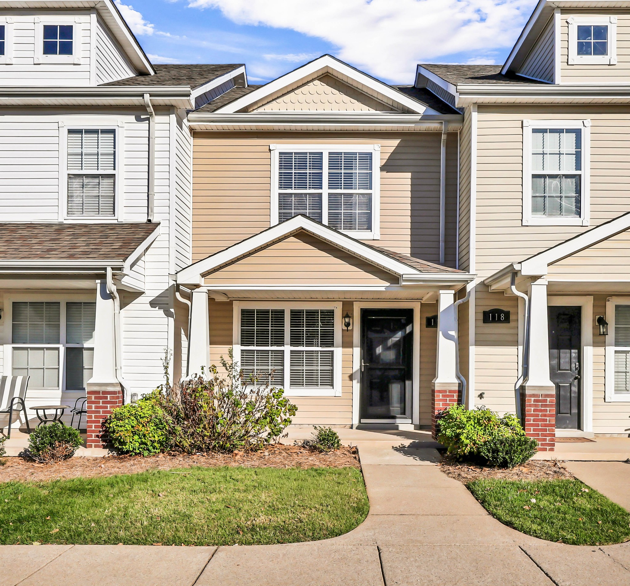 front view of a house and a yard