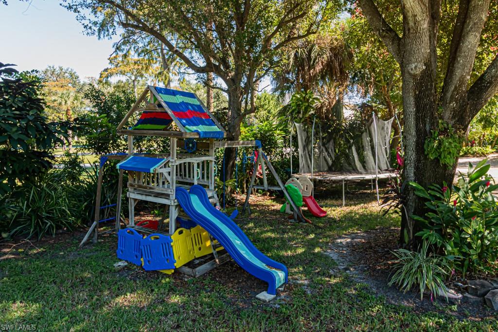 740 31st Street Southwest Naples, FL 34117 - Photo 12 of 50 a view of an outdoor space yard and entertaining space