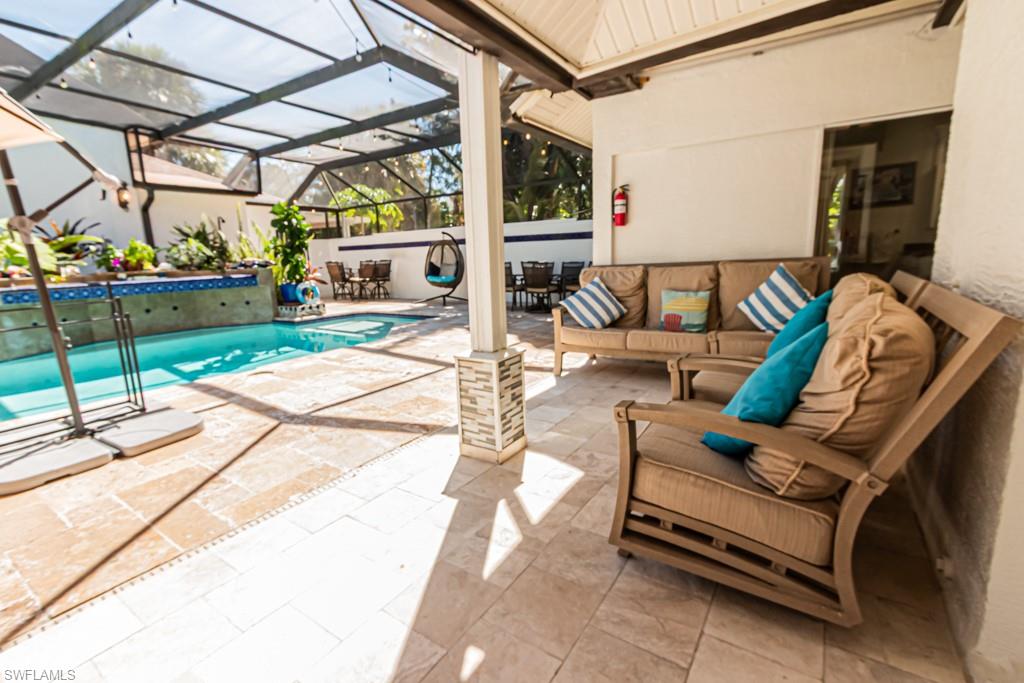 740 31st Street Southwest Naples, FL 34117 - Photo 15 of 50 a outdoor space with lots of furniture and plants