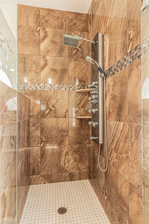 740 31st Street Southwest Naples, FL 34117 - Photo 34 of 50 a bathroom with a shower