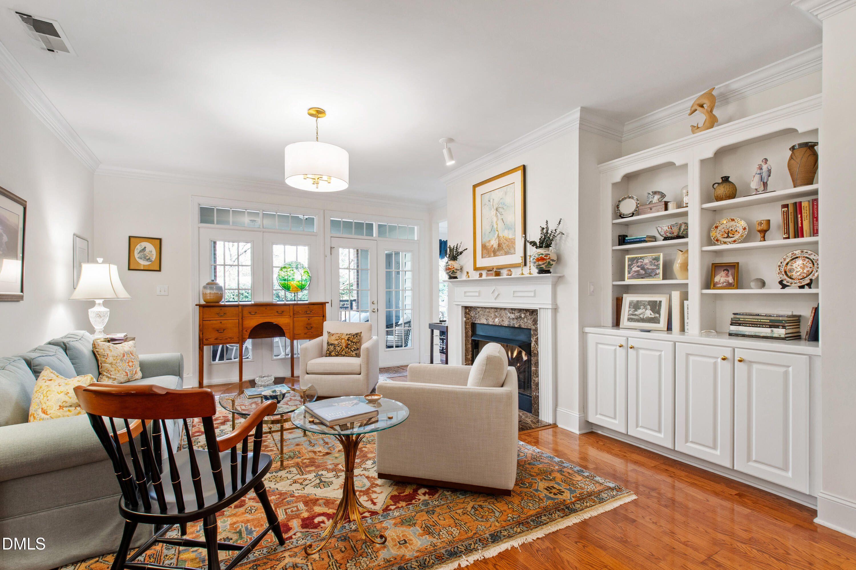 3700 Baron Cooper Pass, Unit 105 Raleigh, NC 27612 - Photo 27 of 49 a living room with fireplace furniture and decor