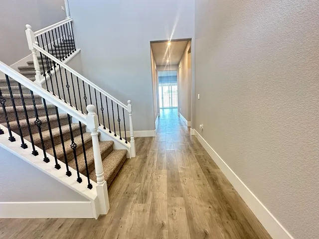 a view of entryway with wooden floor