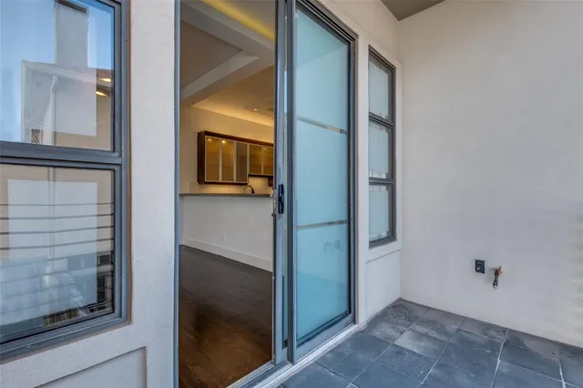 a kitchen with a sink and a refrigerator