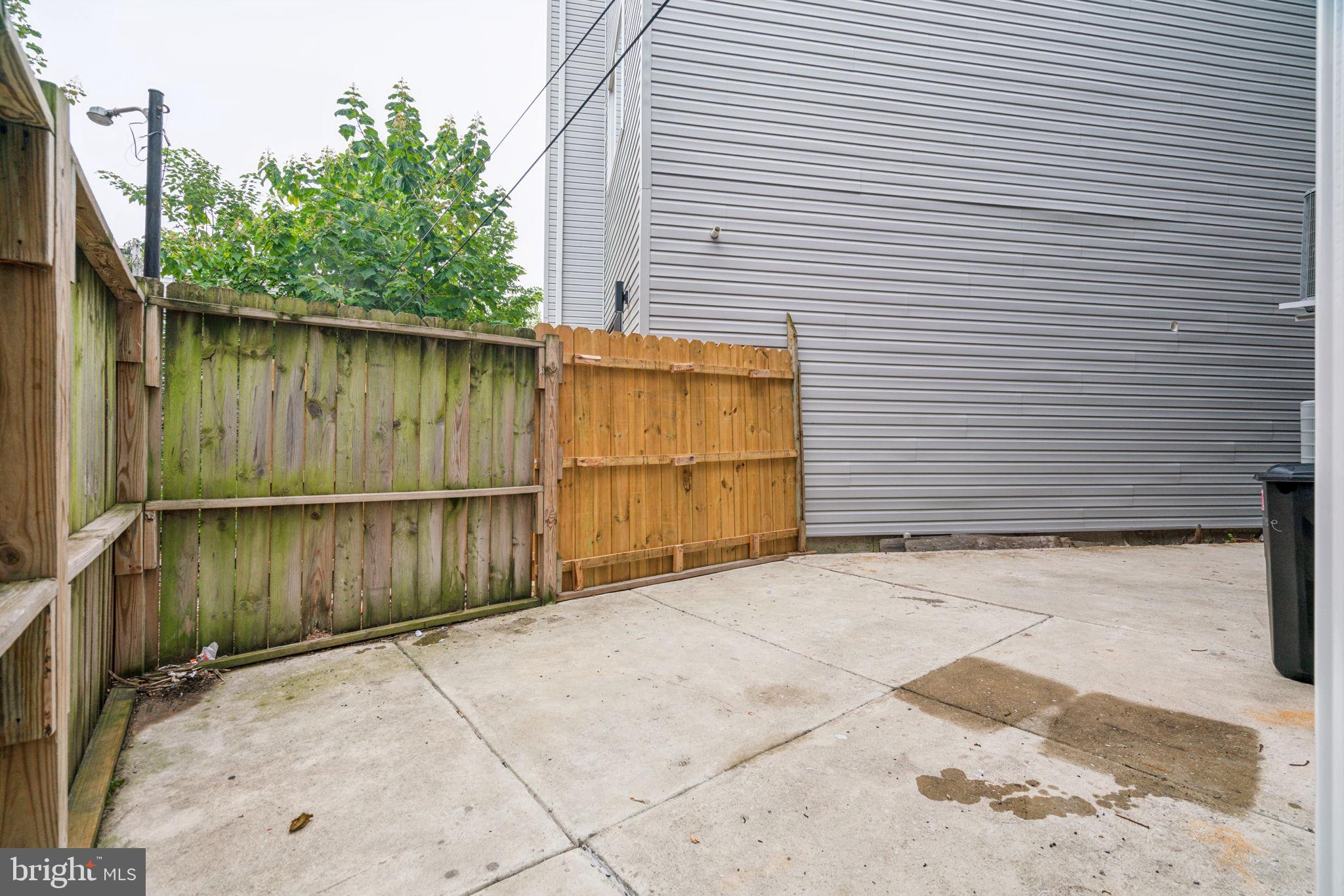 1701 Point Breeze Avenue, Unit 2 Philadelphia, PA 19145 - Photo 19 of 20 Current look prior to March 2026 wood staining