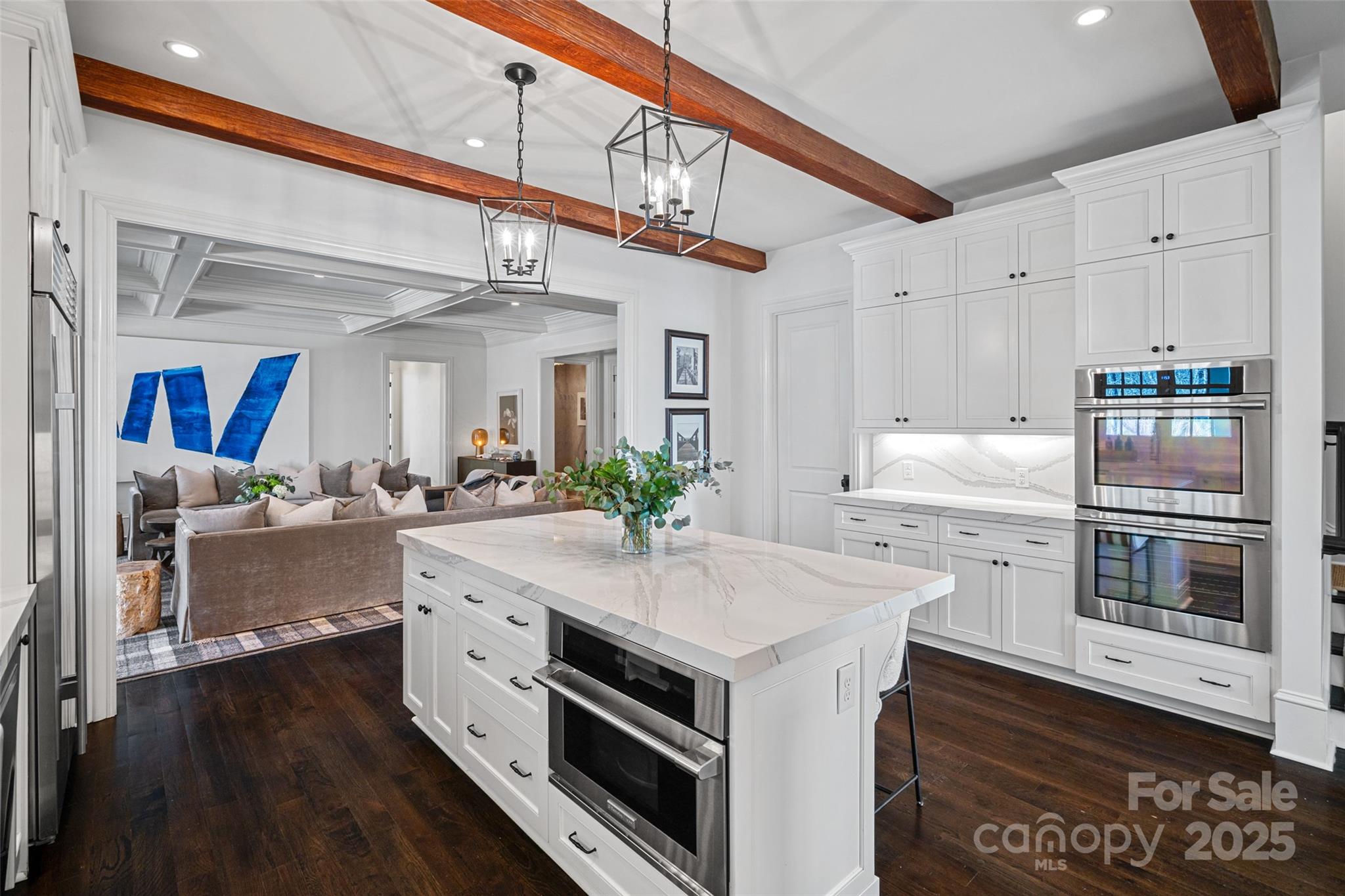 3212 Lazy Branch Road Charlotte, NC 28270 - Photo 14 of 47 a kitchen with a sink stove and cabinets