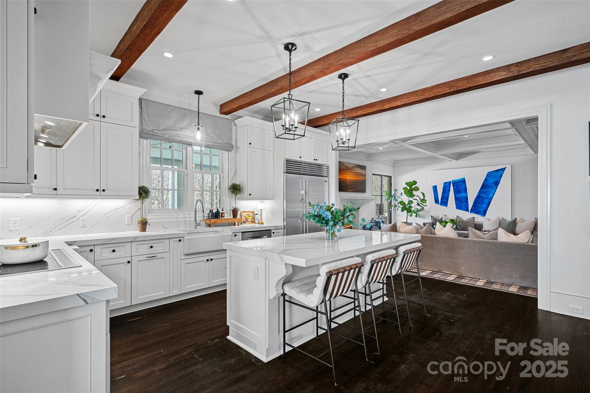 3212 Lazy Branch Road Charlotte, NC 28270 - Photo 18 of 47 a kitchen with a sink cabinets and wooden floor