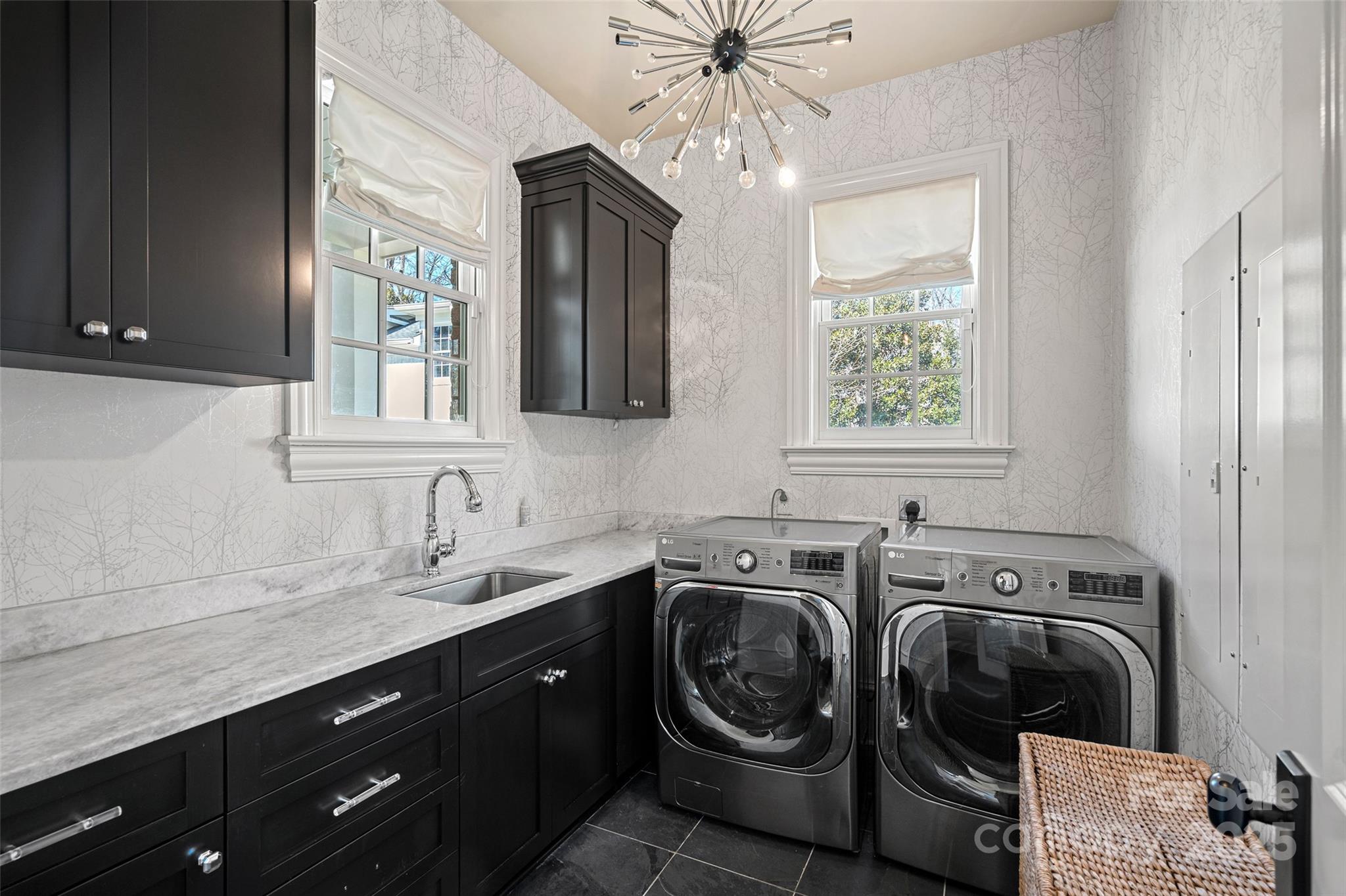 3212 Lazy Branch Road Charlotte, NC 28270 - Photo 32 of 47 a utility room with sink dryer and washer