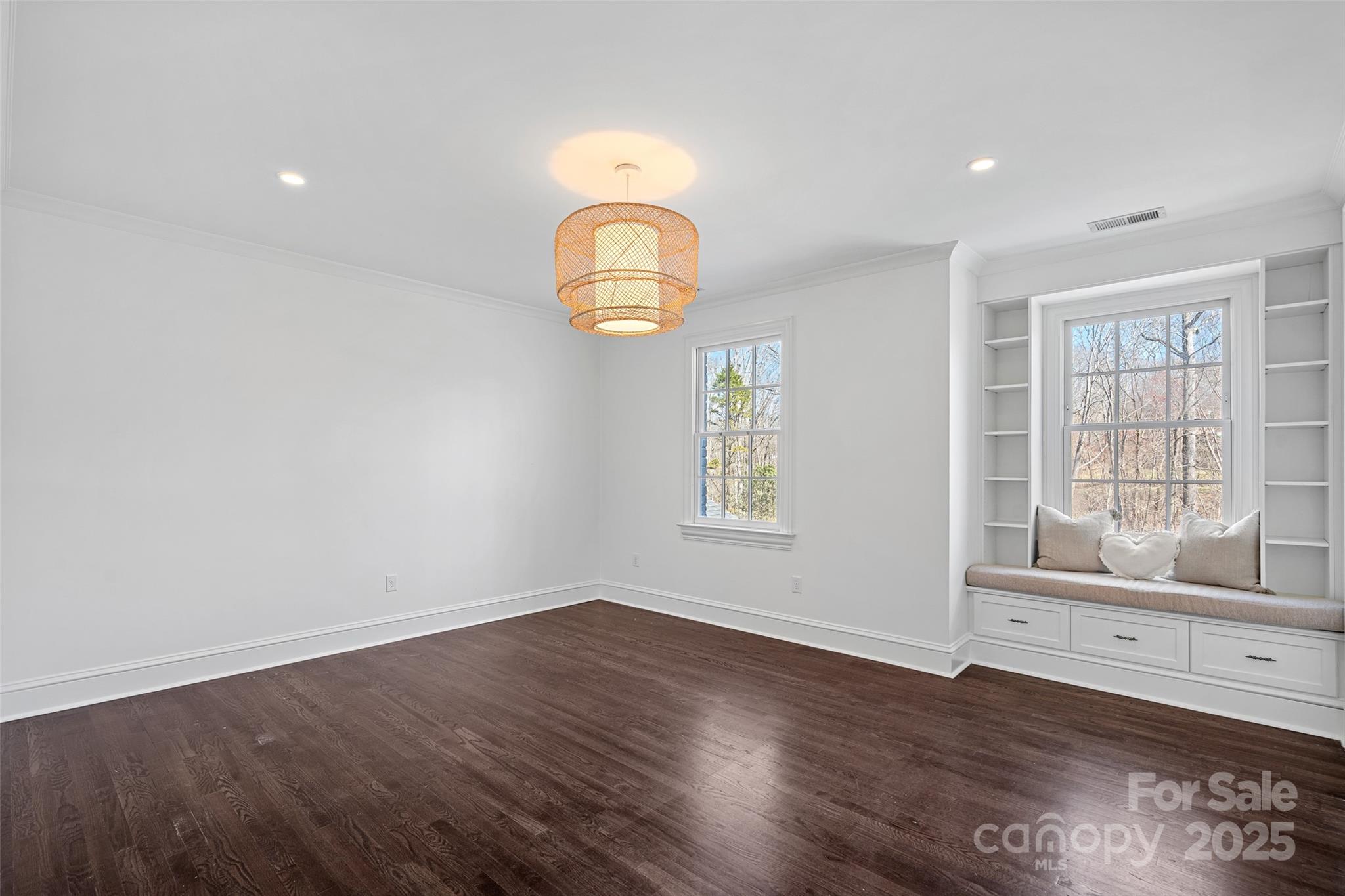 3212 Lazy Branch Road Charlotte, NC 28270 - Photo 37 of 47 an empty room with wooden floor and windows