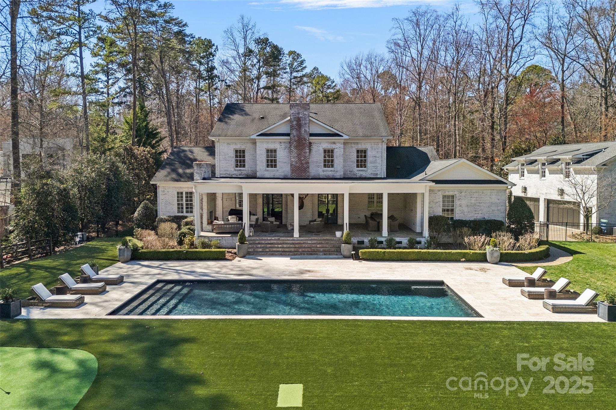 3212 Lazy Branch Road Charlotte, NC 28270 - Photo 4 of 47 a view of house with garden and tall trees