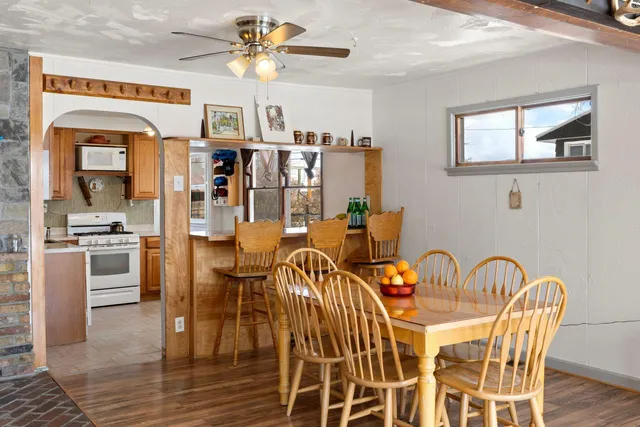 a view of a dining room with furniture