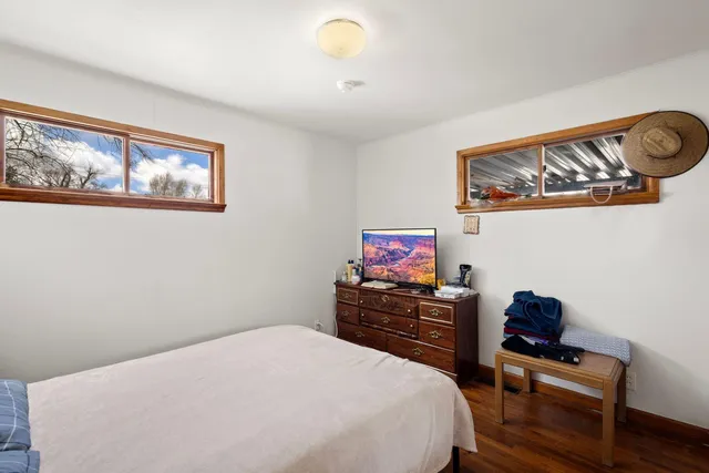 a bedroom with a bed and furniture