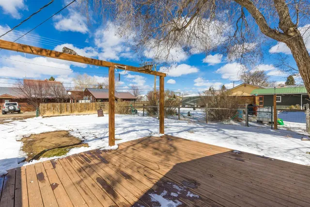 a view of a backyard of the house