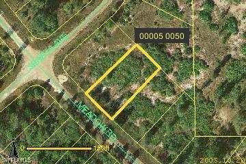 2503 Meadow Road Lehigh Acres, FL 33974 - Photo 1 of 4 a sign broad on the street