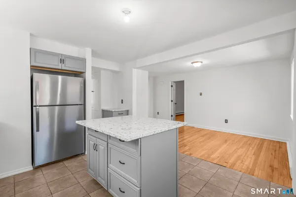 a utility room with cabinets