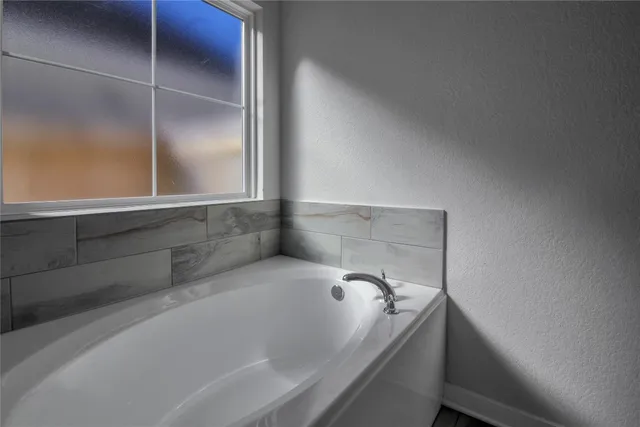 a bathroom with a bathtub