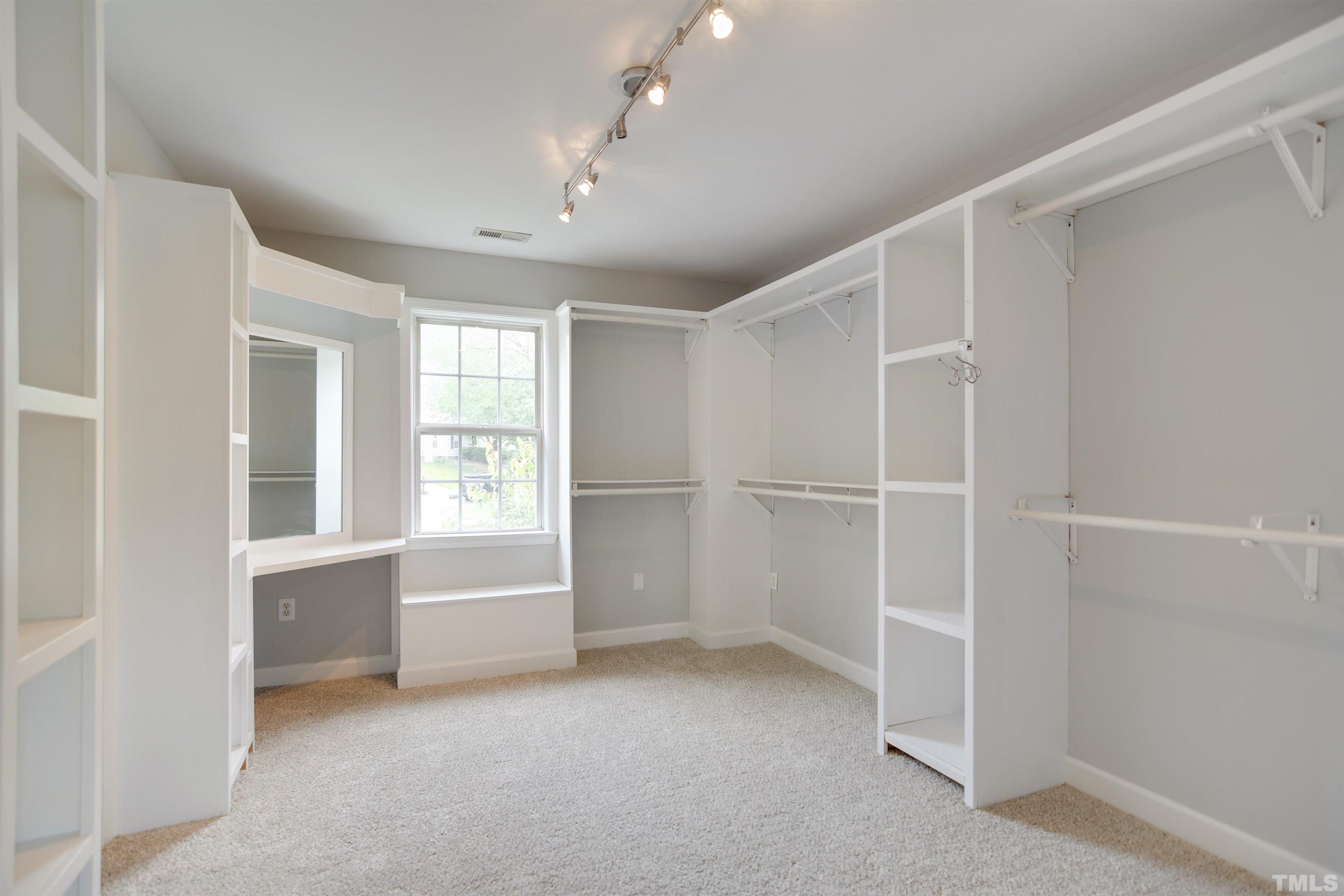 9221 Pennythorne Court Raleigh, NC 27615 - Photo 9 of 23 a view of an empty room with a window