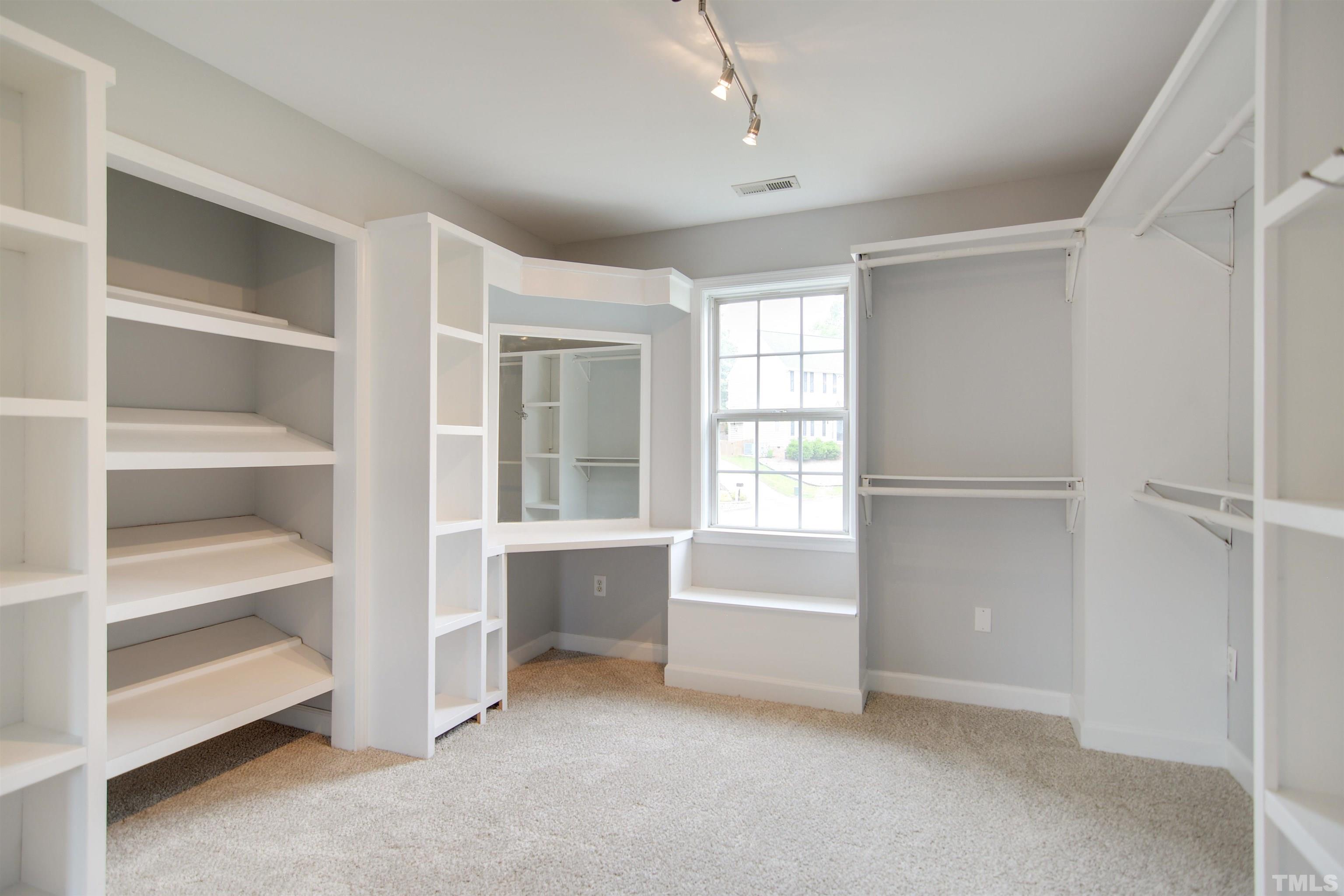 9221 Pennythorne Court Raleigh, NC 27615 - Photo 10 of 23 a view of an empty room with a window