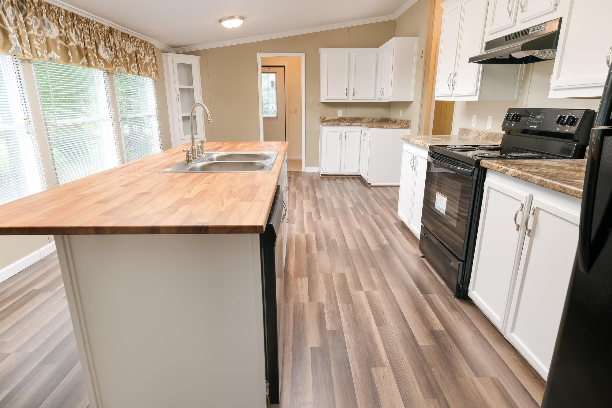 2666 Glass Mill Road Chickamauga, GA 30707 - Photo 9 of 28 a kitchen with a sink stove and refrigerator
