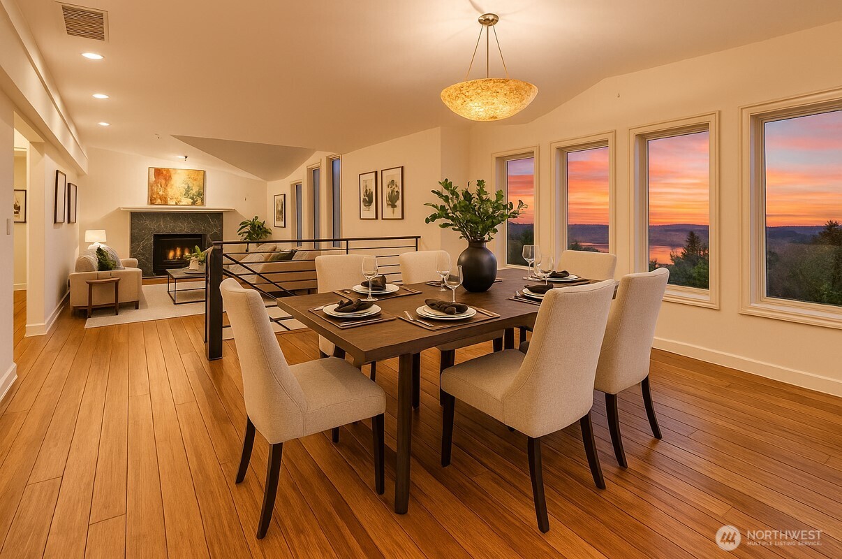 266 Quillayute Place La Conner, WA 98257 - Photo 3 of 17 a view of a dining room with furniture and wooden floor