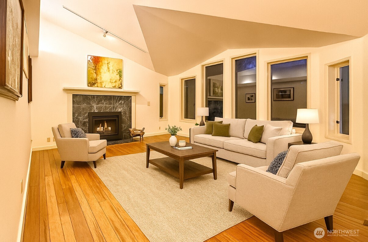 266 Quillayute Place La Conner, WA 98257 - Photo 4 of 17 a living room with furniture and a fireplace