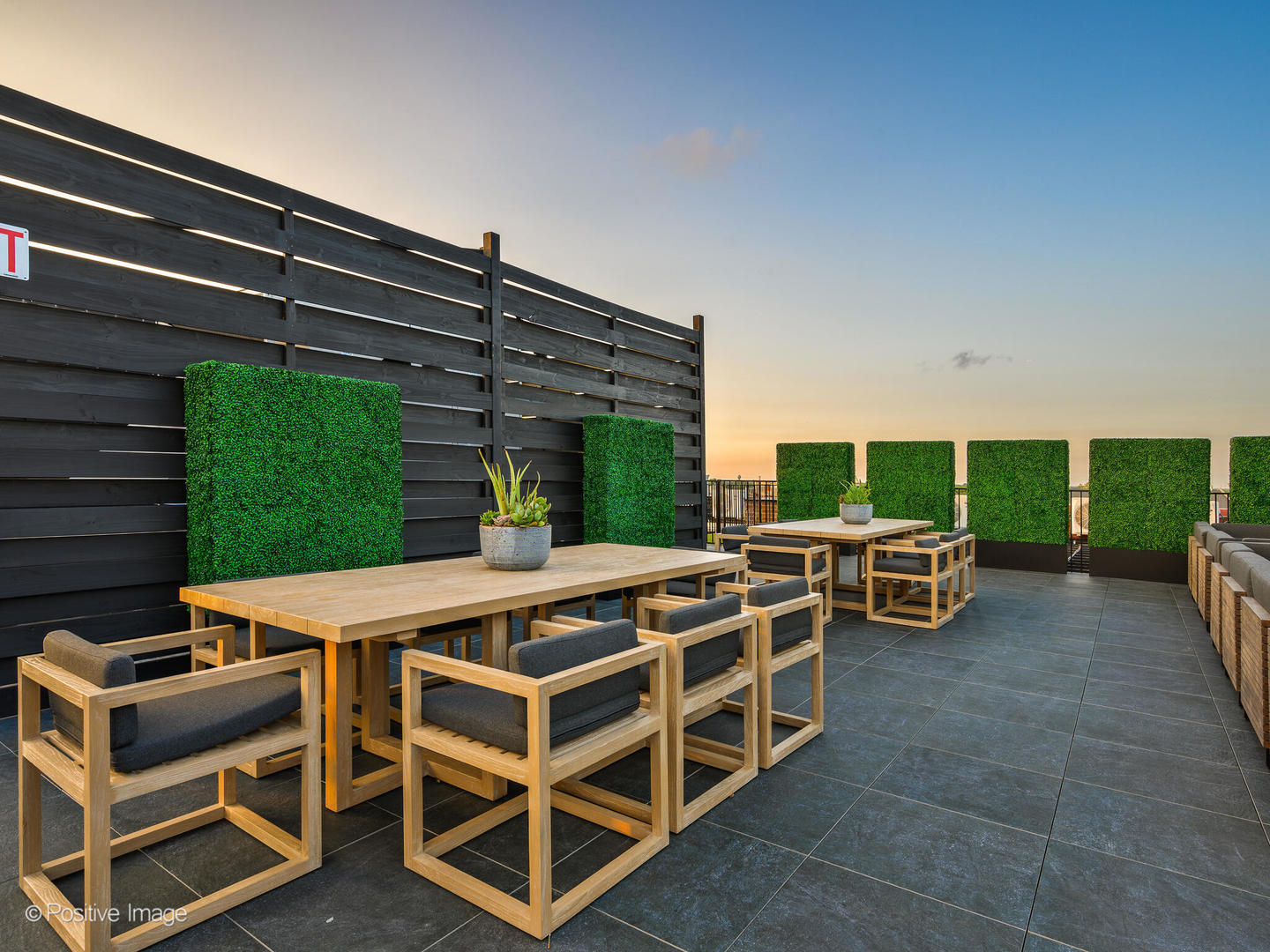 11 West Prospect Avenue, Unit 316 Mount Prospect, IL 60056 - Photo 57 of 72 a view of a patio with table and chairs with a barbeque grill and plants