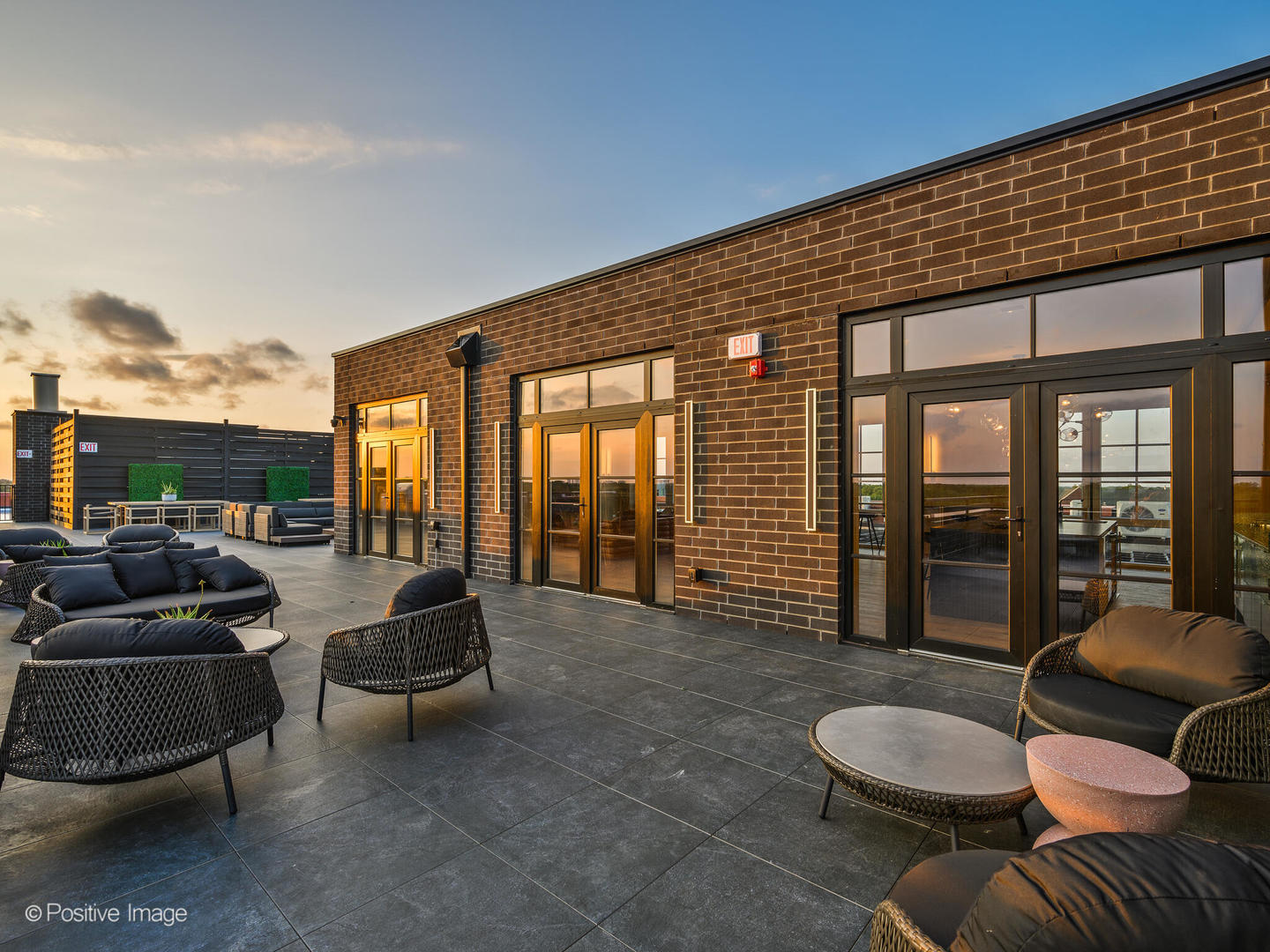 11 West Prospect Avenue, Unit 316 Mount Prospect, IL 60056 - Photo 64 of 72 a living room with furniture and a floor to ceiling window