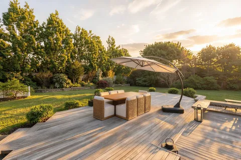 a view of a terrace with trees