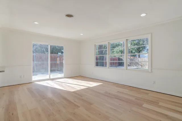 a view of a hallway with a workspace