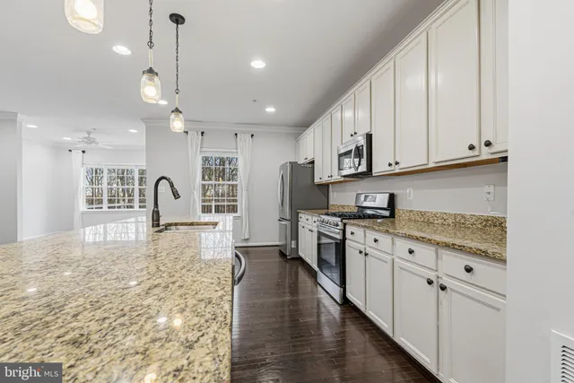 a large kitchen with cabinets