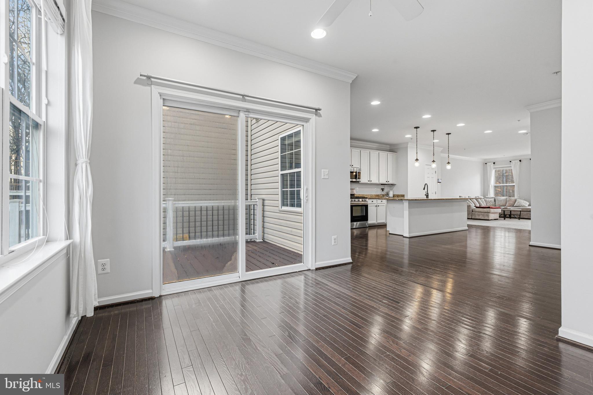 617 English Ivy Way Aberdeen, MD 21001 - Photo 14 of 35 a view of a kitchen with wooden floor and a window