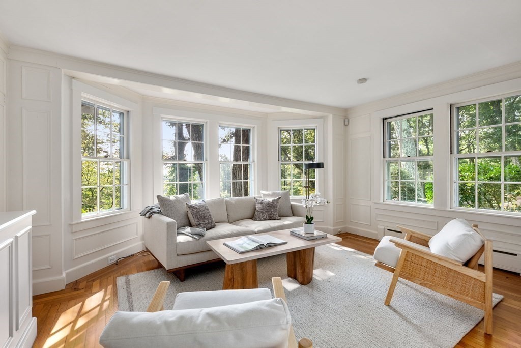 209 Meadowbrook Road Weston, MA 02493 - Photo 18 of 32 a living room with furniture and a large window