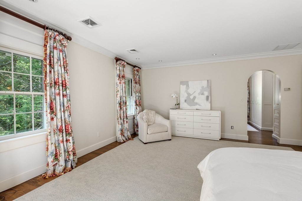 209 Meadowbrook Road Weston, MA 02493 - Photo 21 of 32 a bedroom with a bed and a window