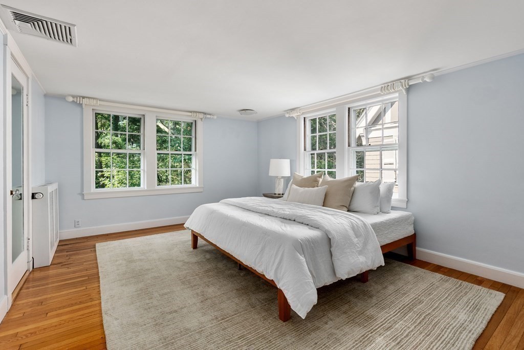 209 Meadowbrook Road Weston, MA 02493 - Photo 22 of 32 a bedroom with a bed and a window