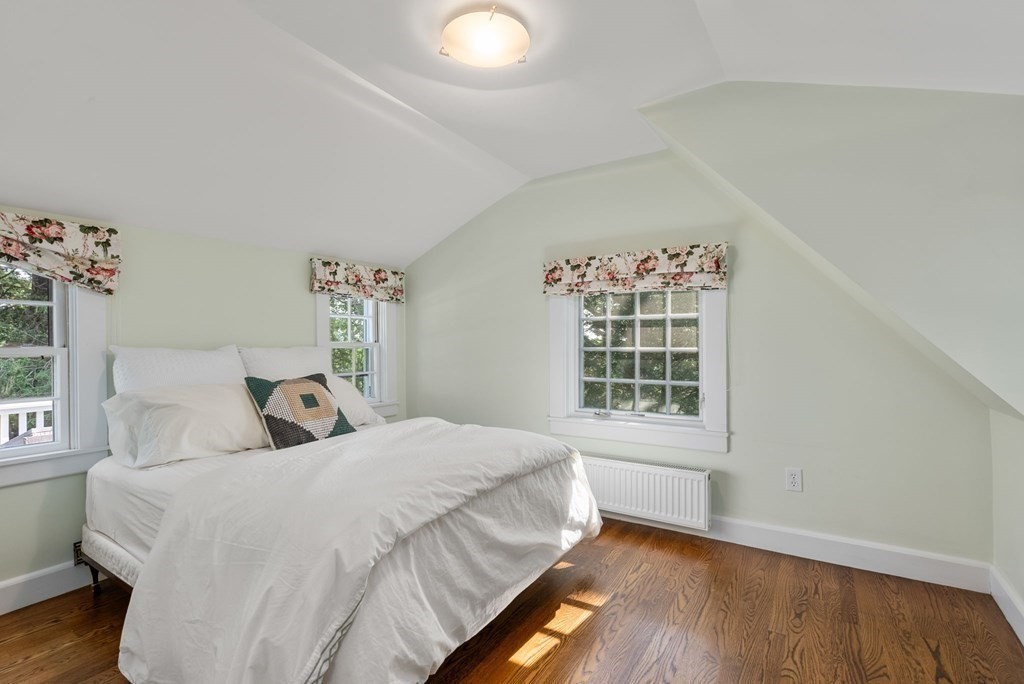 209 Meadowbrook Road Weston, MA 02493 - Photo 24 of 32 a bedroom with a bed and a window