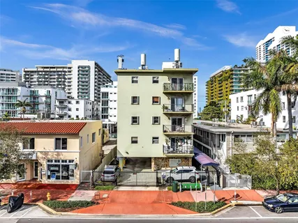 a front view of a building with street view