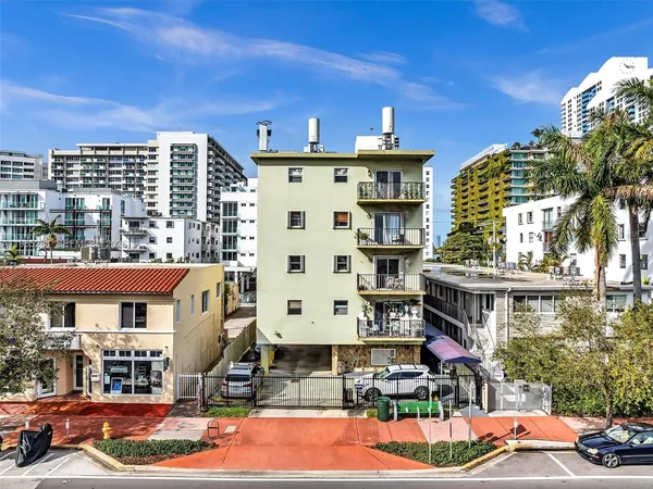 a front view of a building with street view