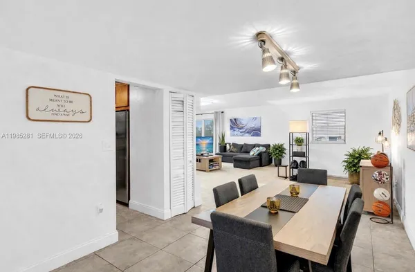 a view of a dining room with furniture