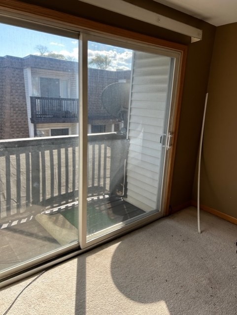 10620 Brooks Lane, Unit 2C2 Chicago Ridge, IL 60415 - Photo 5 of 12 a view of a glass door