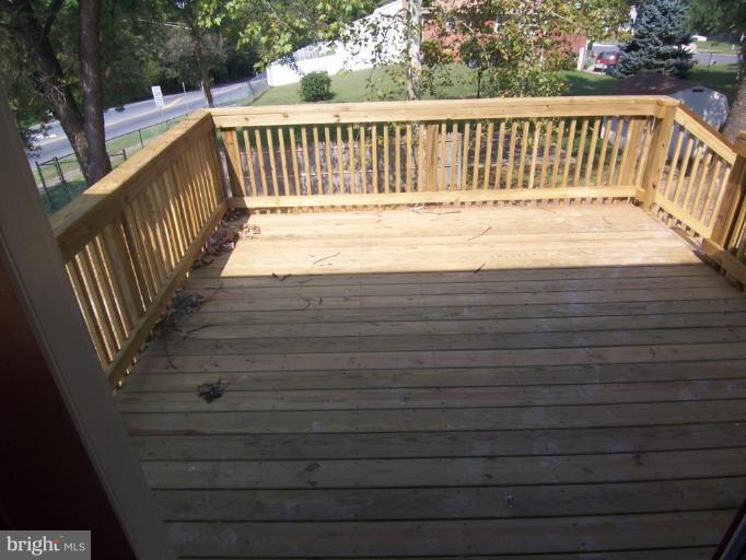 2400 Kingsway Road Fort Washington, MD 20744 - Photo 7 of 15 a view of deck and wooden floor