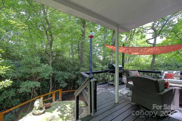 a balcony with chairs