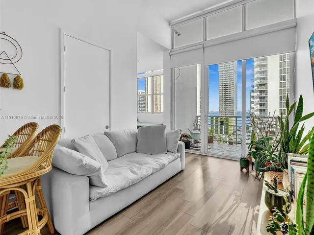 a view of hall with a couch