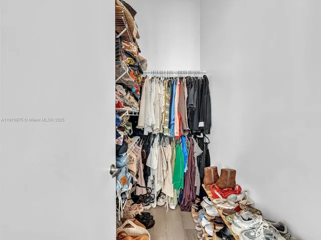 a bathroom with a toilet a sink and a shower