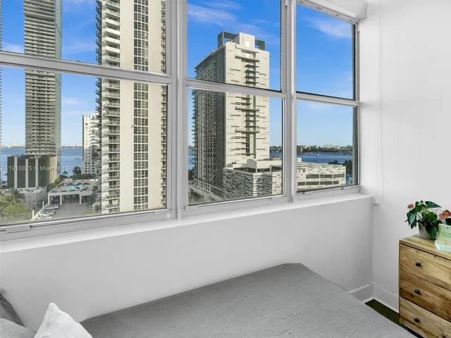 a view of a swimming pool with a lounge chairs